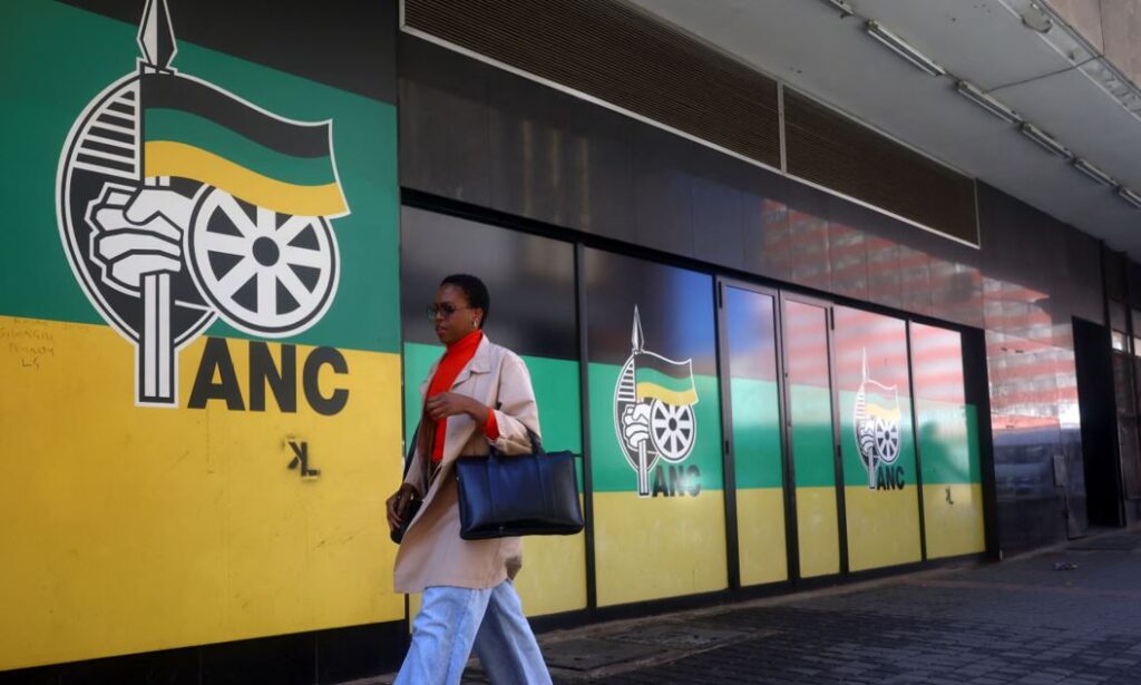 FILE | Women walk past ANC’s office building.