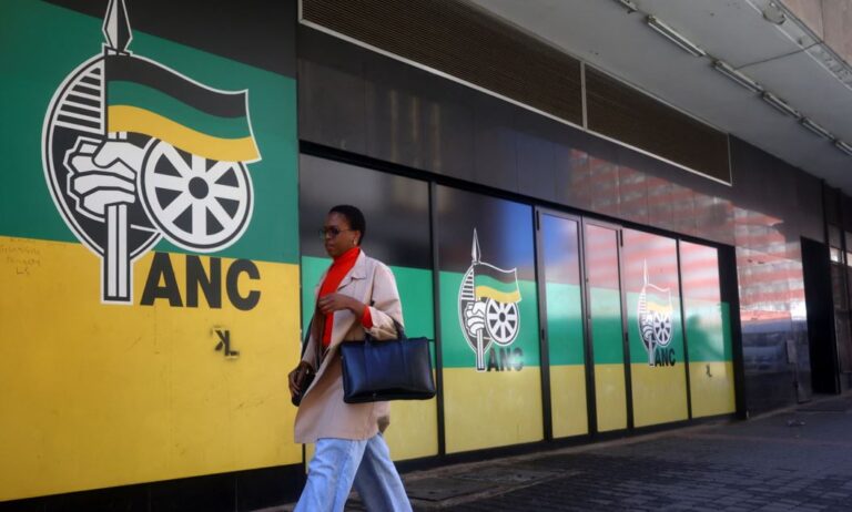 FILE | Women walk past ANC’s office building.